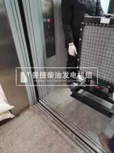 濟源酒店備用50千瓦發電機乘貨梯至樓頂